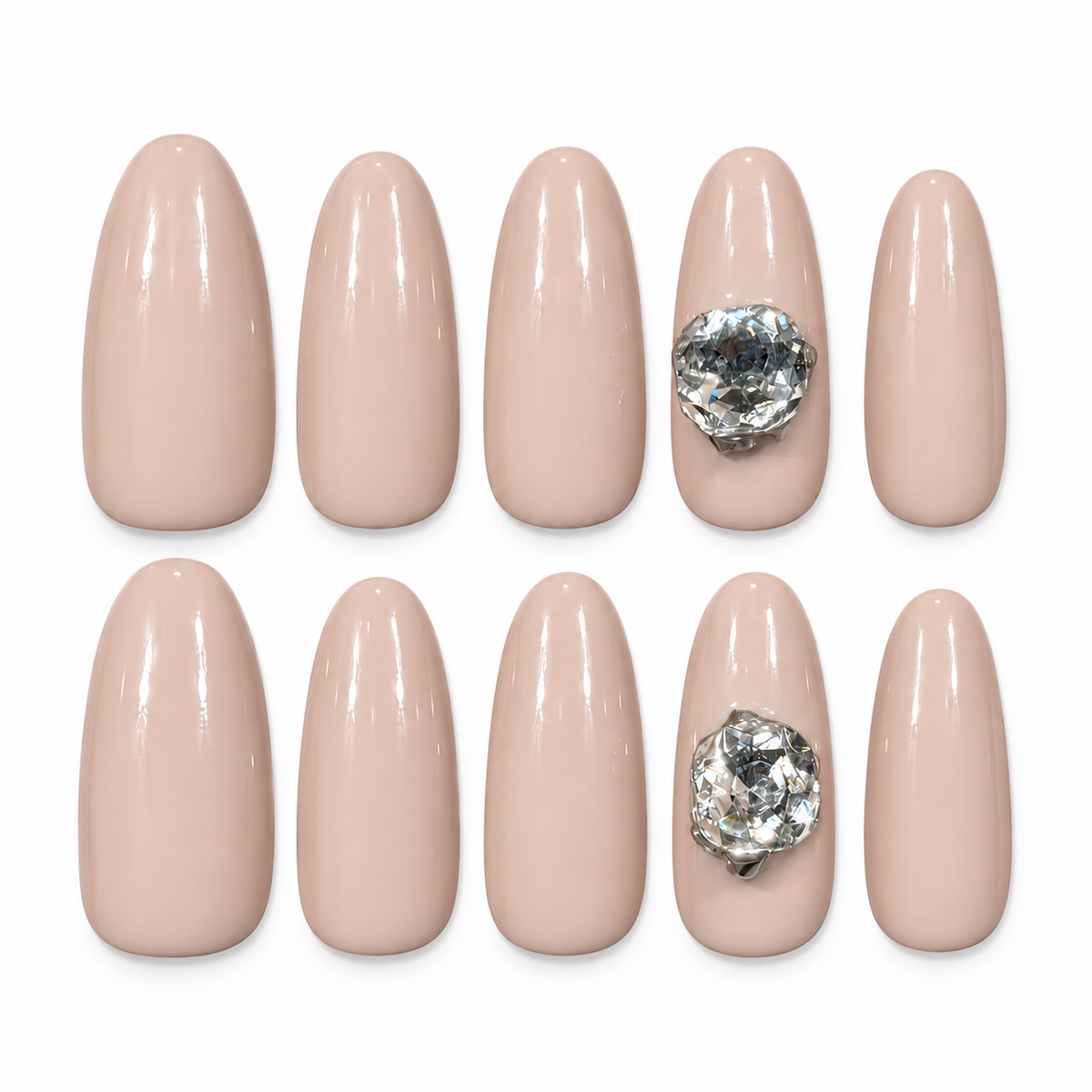 Ten glossy milky-beige Bare Jewel press-on nails arranged in two rows, with two clear crystal accent nails