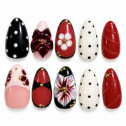 Burgundy and black 3D floral medium almond press-on nails with white flowers