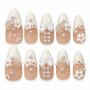 Pearl Bouquet white French tip floral pearl medium almond press-on nails with a bow