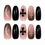 Shadow Cross black and smoky pink cross medium oval press-on nails