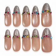 Silver Veil nude pink and silver French tip medium oval press-on nails with rhinestones