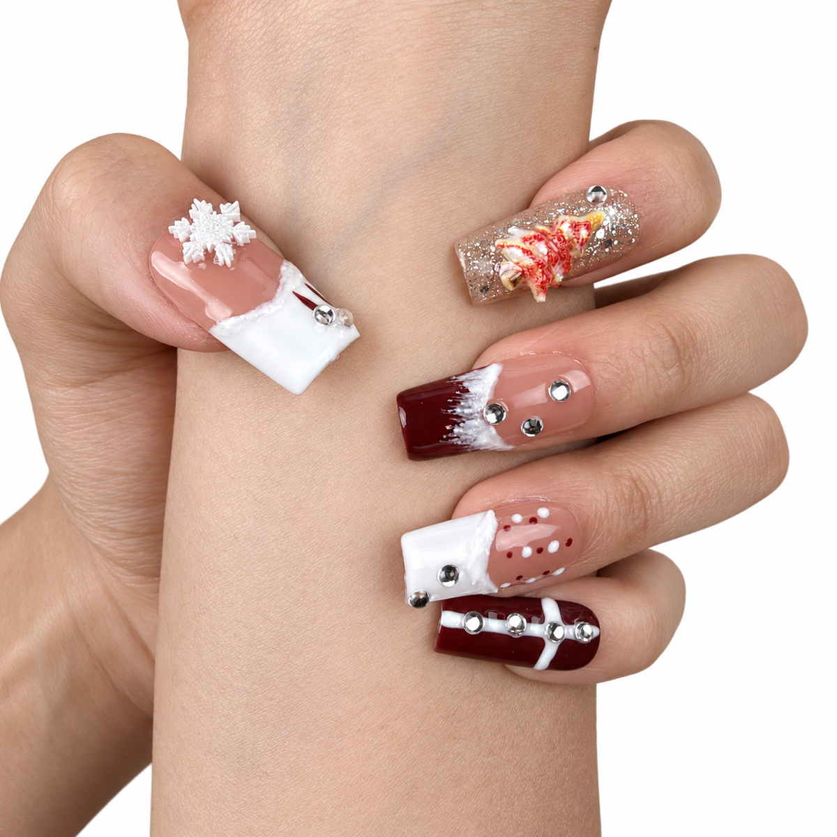 Close-up of hands wearing Winter Rose burgundy glitter and white snowflake Christmas square press-on nails