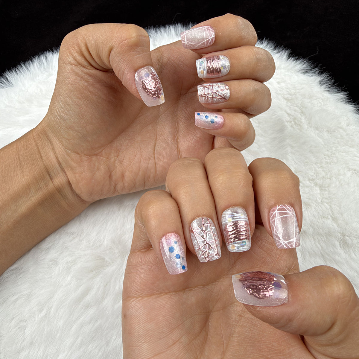 Hands wearing Pastel Sketch pastel abstract line art square press-on nails