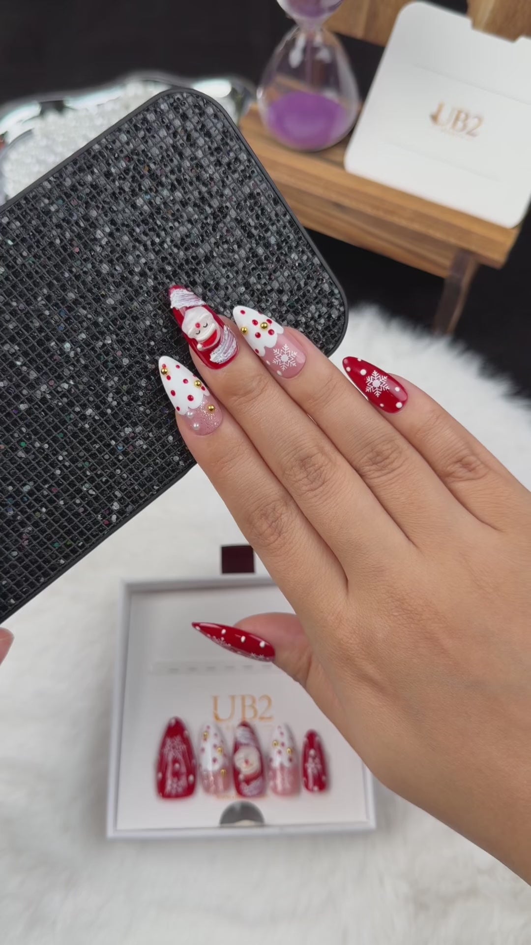 Load video: Step-by-step application of Santa Snow red and white Santa Christmas almond press-on nails
