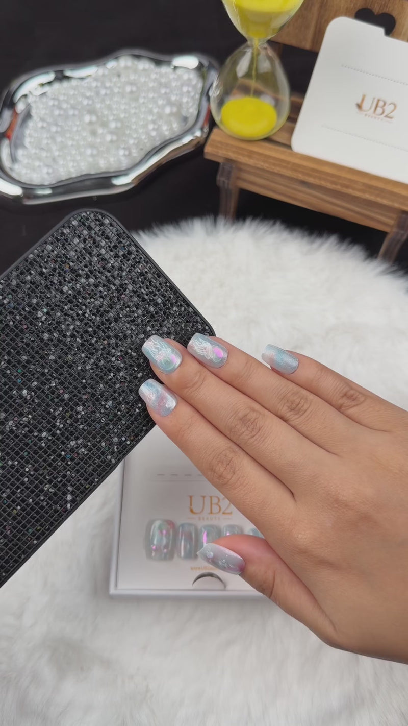 Step-by-step application of Jellyfish Drift blue iridescent jellyfish square press-on nails
