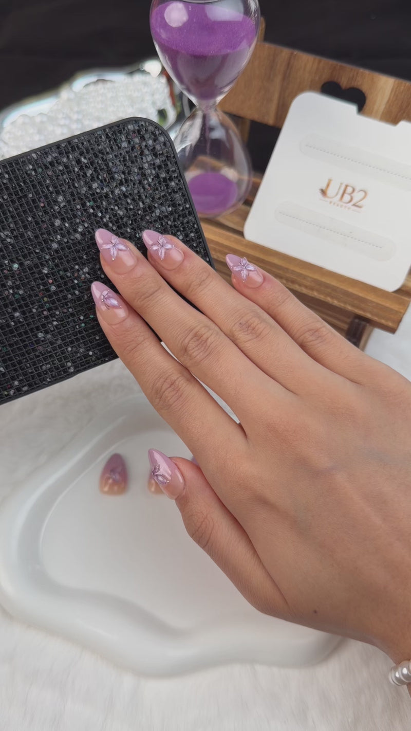 Step-by-step application of Lavender butterfly ombre nude pink and lilac almond press-on nails