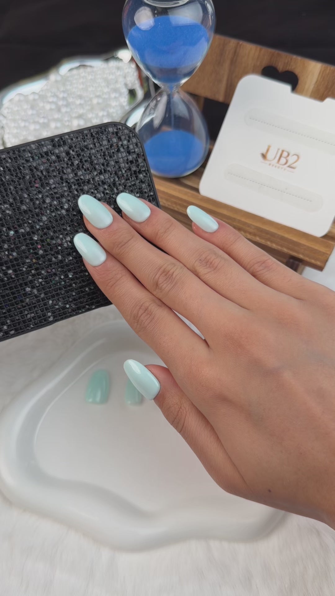 Load video: Step-by-step application of Soft light blue glossy solid color press-on nails