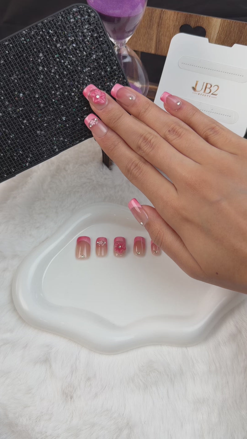 Step-by-step application of Rose pink French tip 3D floral medium square press-on nails