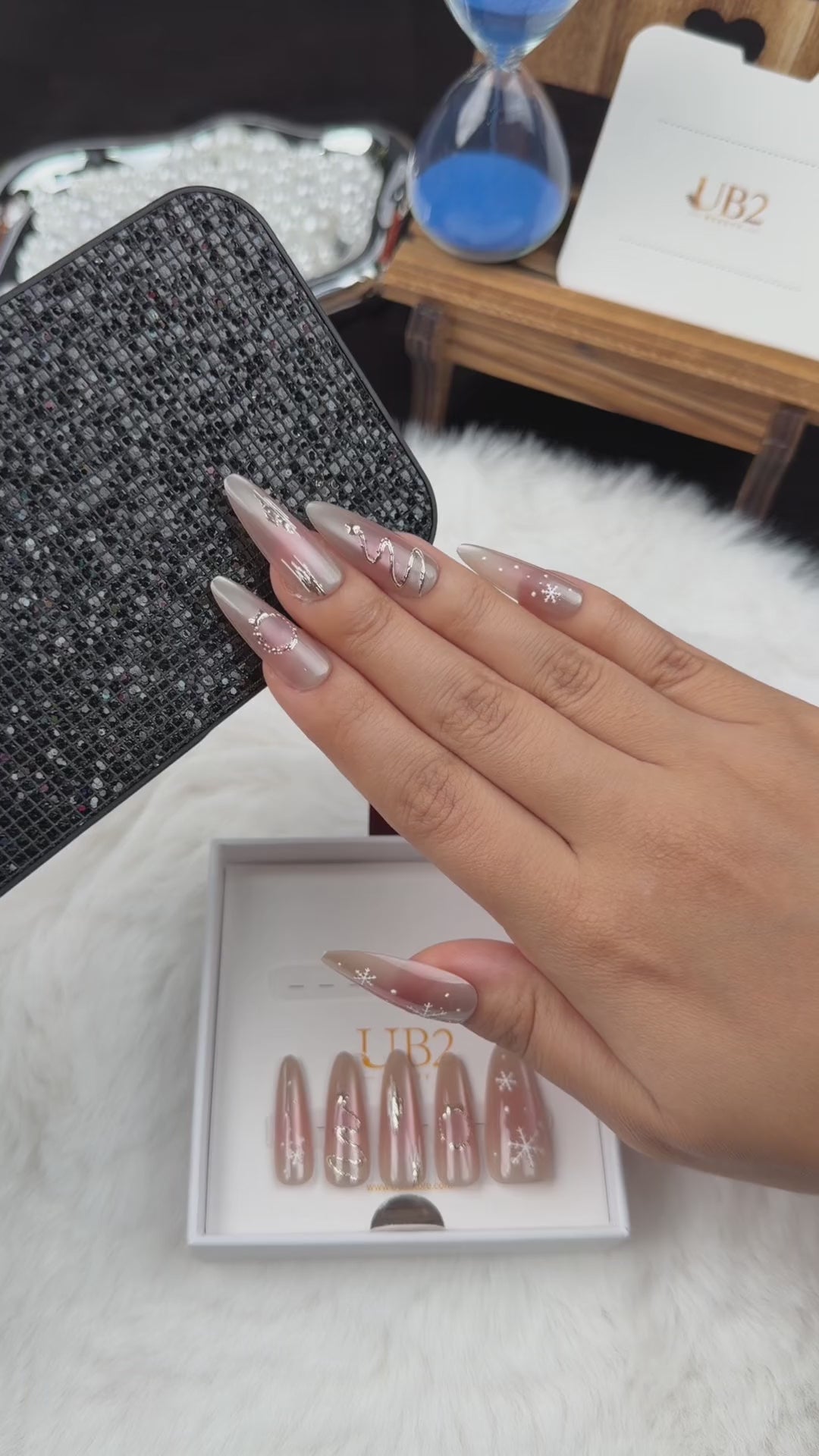 Load video: Step-by-step application of Winter Orbit champagne snowflake Christmas almond press-on nails