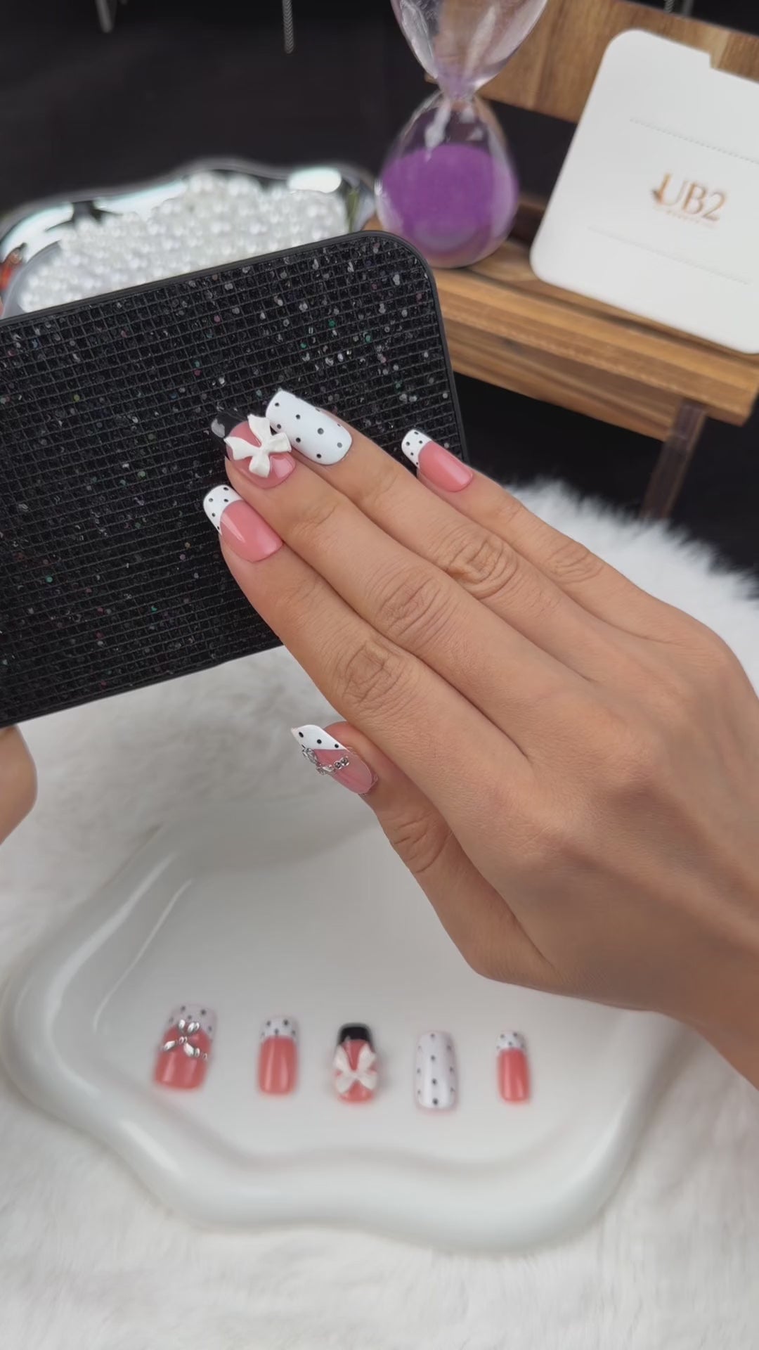 Load video: Step-by-step application of Polka Bow black and white polka dot bow square press-on nails