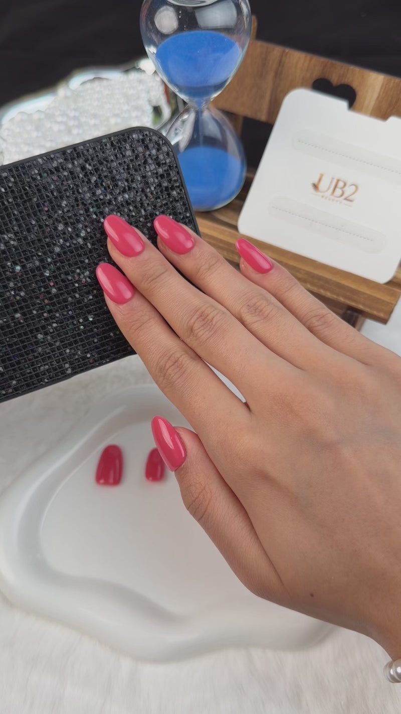 Step-by-step application of Coral Jelly coral pink glossy short oval press-on nails