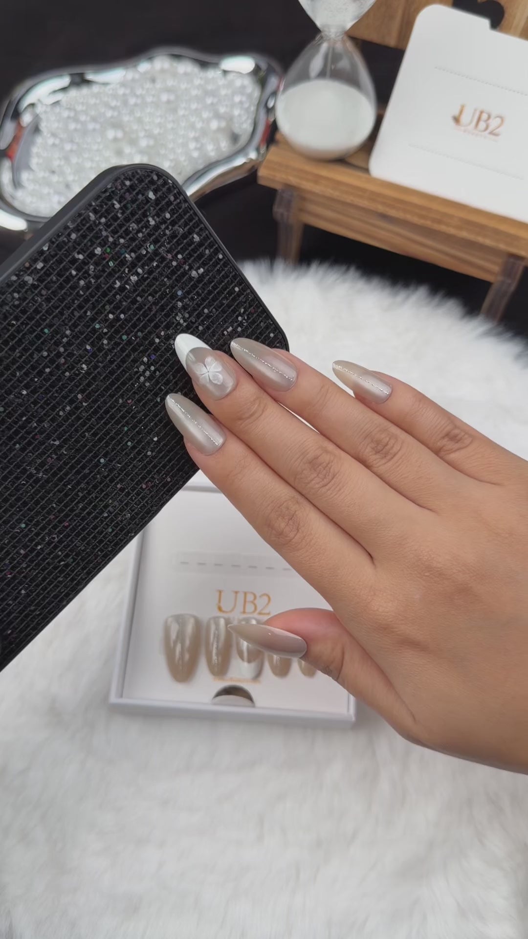 Load video: Step-by-step application of Pearl Petal nude pearl French tip almond press-on nails