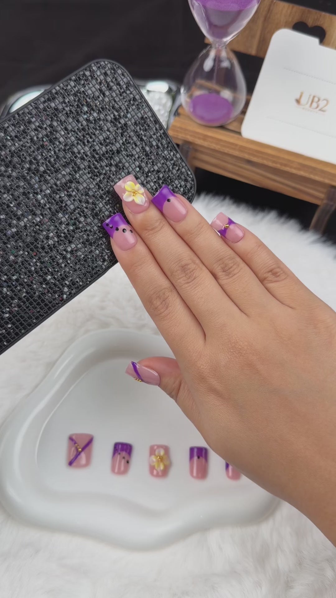 Load video: Step-by-step application of Violet Ribbon purple and yellow floral square press-on nails