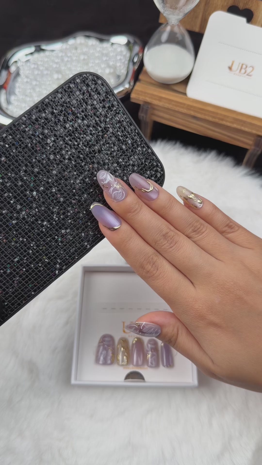 Load video: Step-by-step application of Lavender Vine lavender floral almond press-on nails with gold accents
