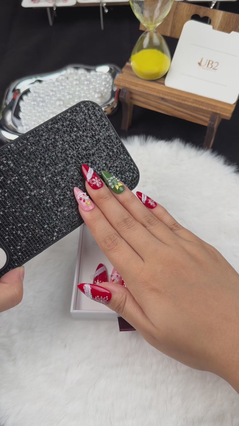 Step-by-step application of Evergreen Ribbon red, pink and green snowflake Christmas almond press-on nails