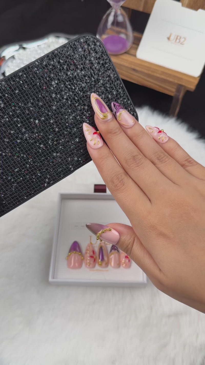 Step-by-step application of Amethyst Bloom purple and gold floral almond press-on nails