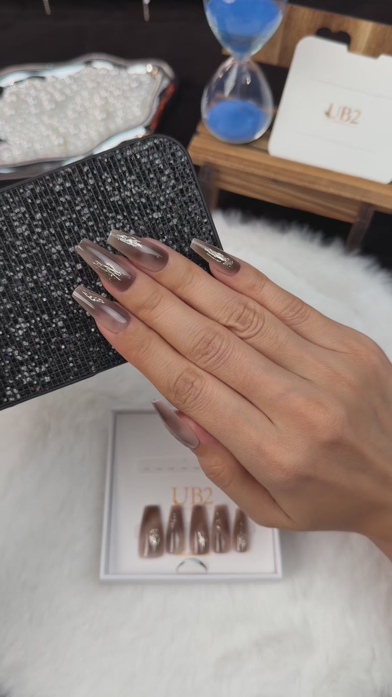 Step-by-step application of Mocha Foil brown chrome coffin press-on nails with metallic foil accents