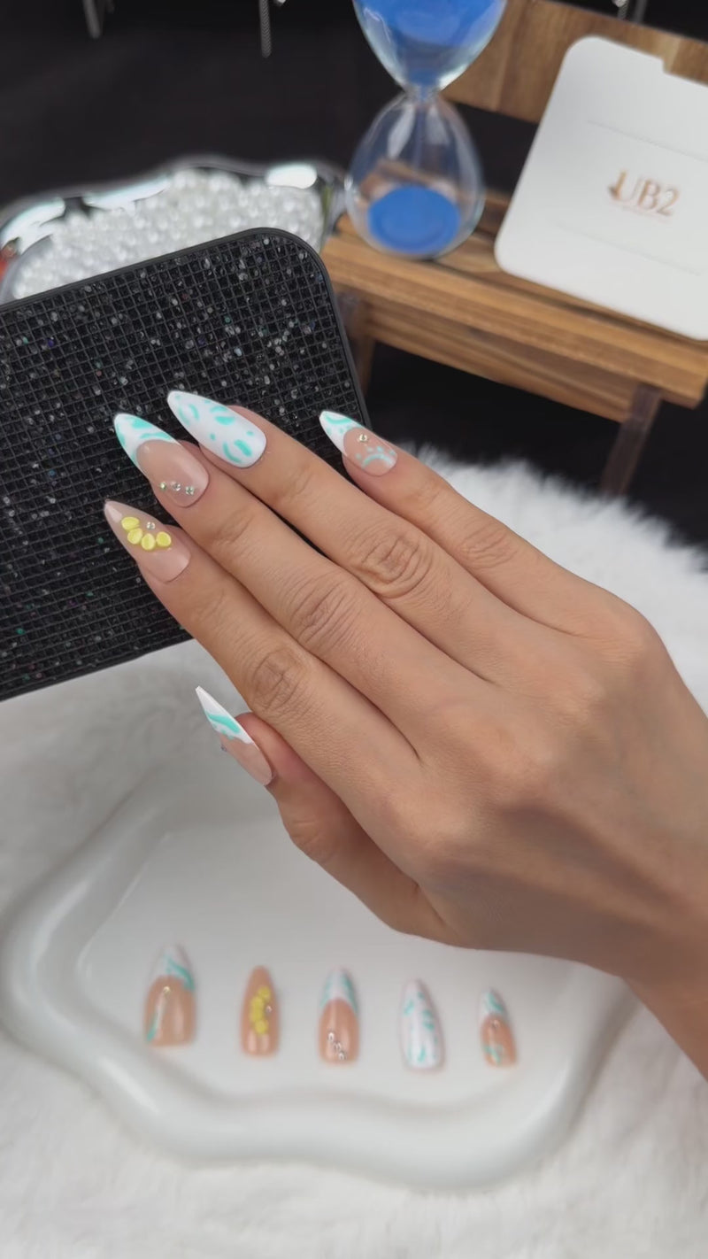 Step-by-step application of Turquoise Tide turquoise French tip and yellow floral almond press-on nails