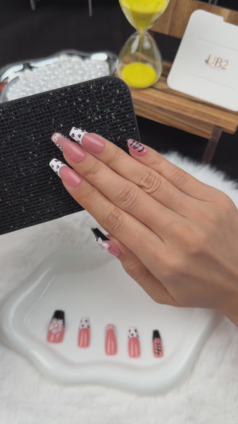 Step-by-step application of Noir Bouquet black French tip and pale pink floral square press-on nails
