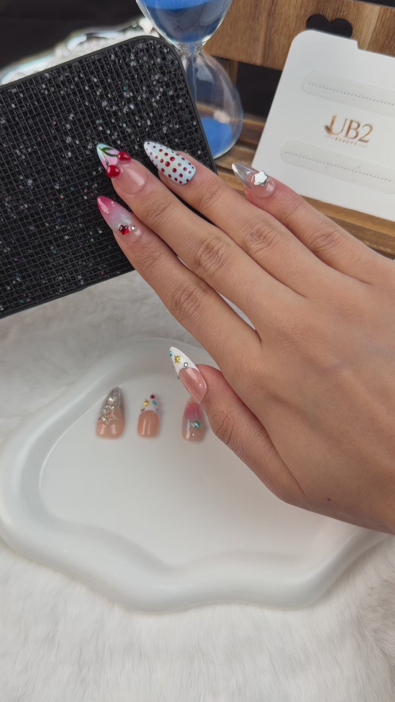 Step-by-step application of Cherry Rodeo red cherry and blush pink medium almond press-on nails