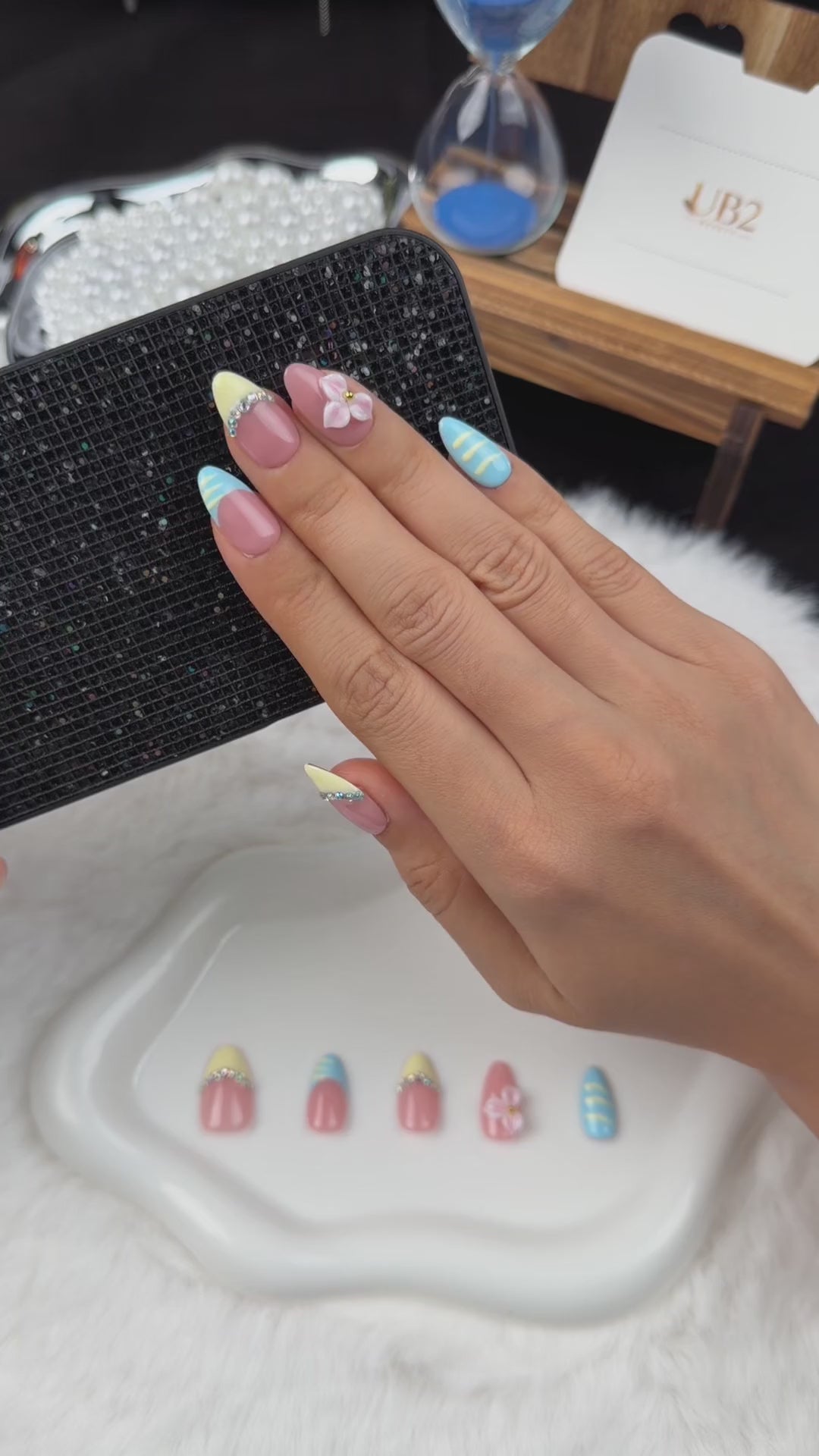 Load video: Step-by-step application of Lemon Sky yellow and blue French tip floral almond press-on nails