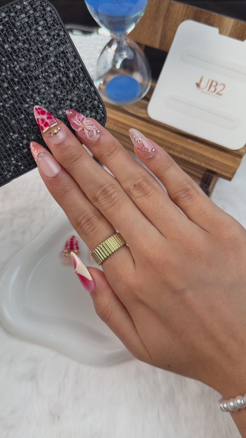 Step-by-step application of Strawberry Bloom nude pink and berry red floral medium almond press-on nails