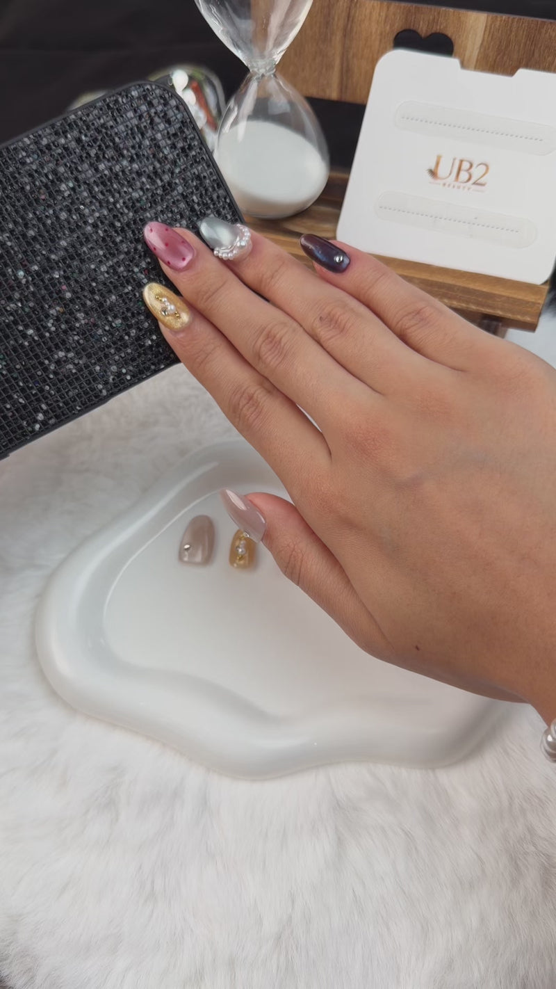 Step-by-step application of Prism Mood multicolor cat eye pearl short oval press-on nails