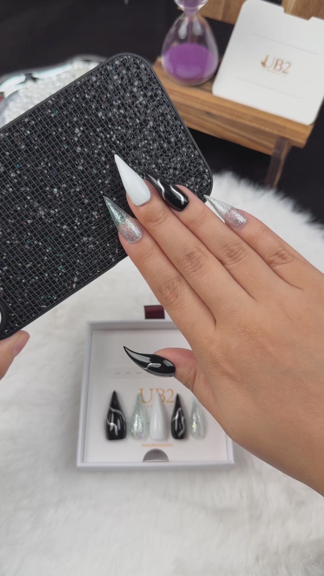 Load video: Step-by-step application of Silver Current black, white and silver glitter stiletto press-on nails