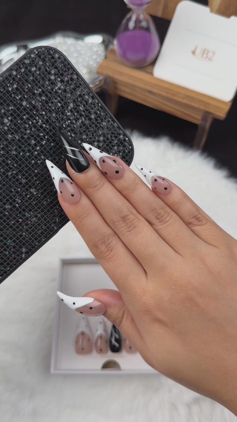 Step-by-step application of Ink Dots black and white polka dot stiletto press-on nails