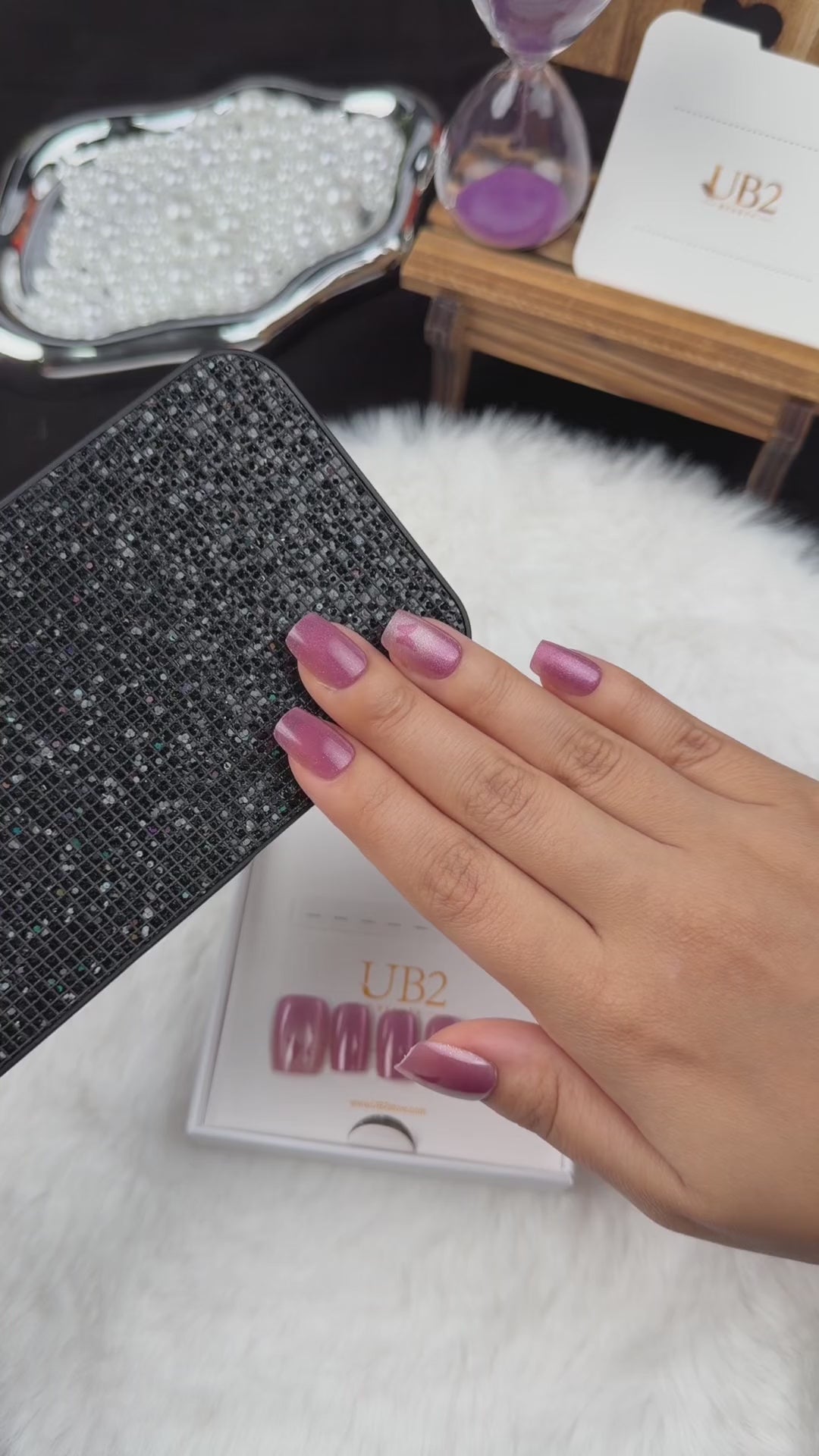 Load video: Step-by-step application of Rose Wings rose pink cat eye square press-on nails with butterfly accents