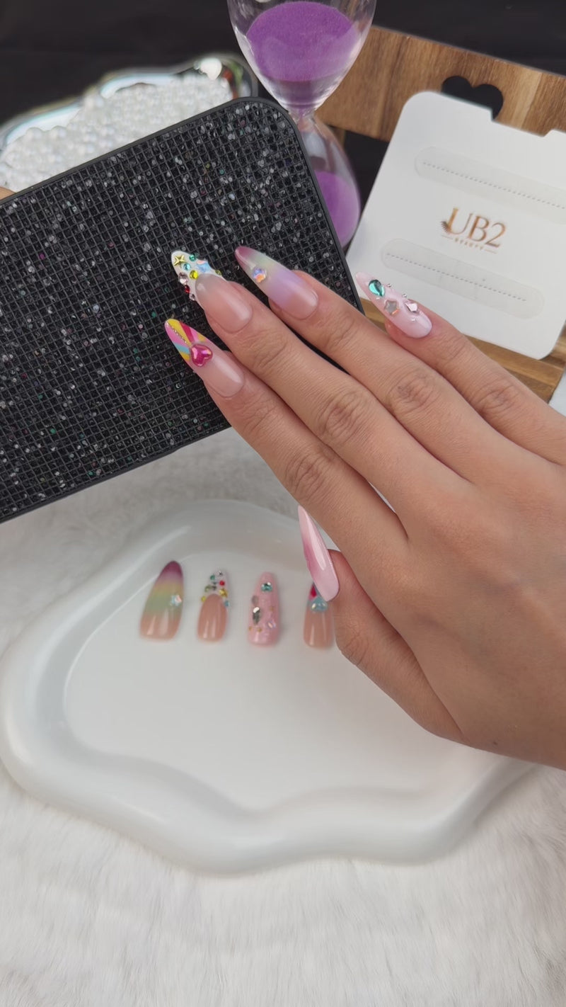 Step-by-step application of Sugar Pop pastel rainbow crystal heart Y2K medium almond press-on nails